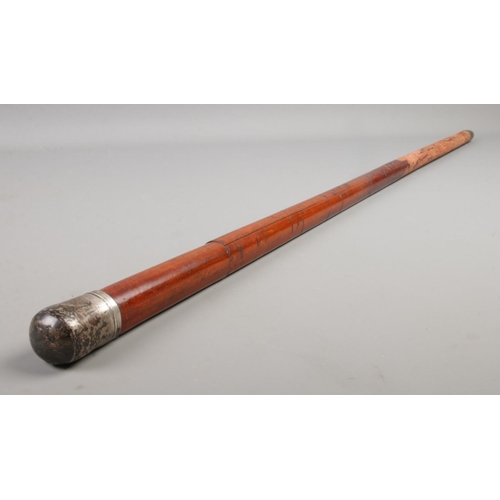 393 - An early twentieth century silver topped Malacca swordstick; with the top assayed for Birmingham, 19... 