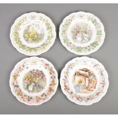 394 - Four Royal Doulton Brambly Hedge seasons plates; Spring, Summer, Autumn and Winter.