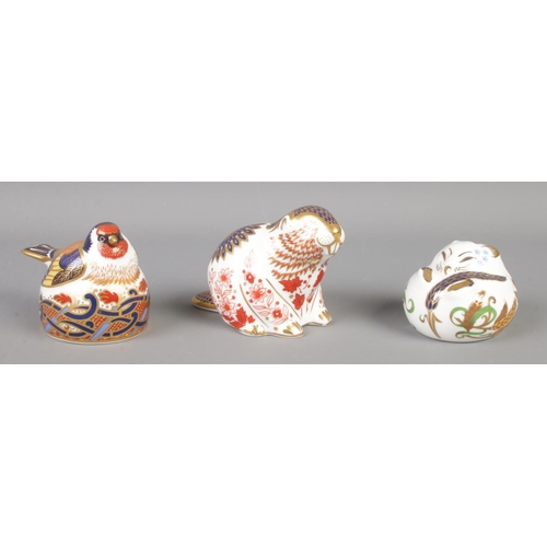 403 - Three Royal Crown Derby paperweights, all with silver stoppers. Comprises of 'Nesting Goldfinch', Be... 