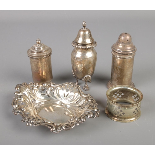 408 - A small collection of silver. Includes pierced trinket dish, salt shakers, napkin ring. 180g.