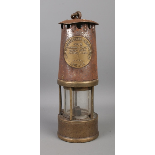 90 - An Eccles Type SL Safety Lamp, by The Protector Lamp and Lighting Co Ltd. Stamped for marker '6'.