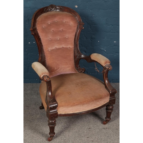 432 - A carved mahogany French style upholstered armchair.