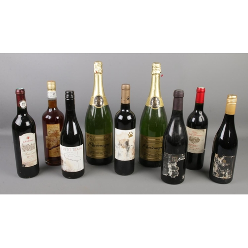 95 - A collection of sealed alcohol. Includes Pineau Des Charentes, Simpson's rose, etc.