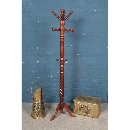 464 - A Victorian style mahogany coat and hat stand on triform base with brass coal scuttle and box