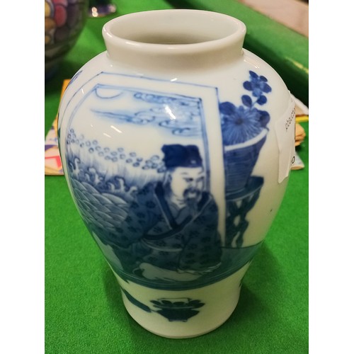 415 - A Chinese blue & white vase decorated with figures. Spurious Kangxi marks to the base. (12cm)