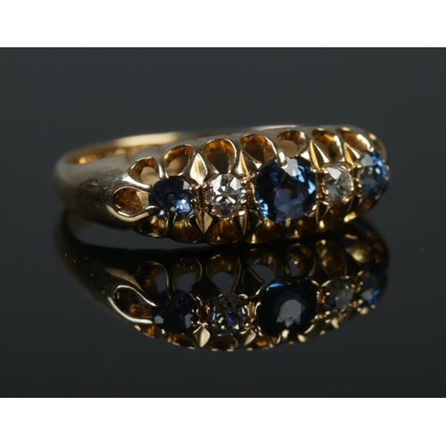 248 - An early 20th century 18ct gold sapphire and diamond five stone ring. Size K. 2.97g.