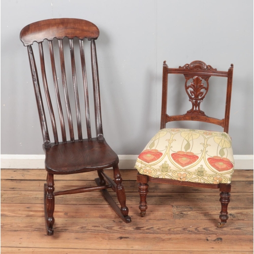 349 - A spindle back rocking chair along with upholstered hall chair with carved floral supports.