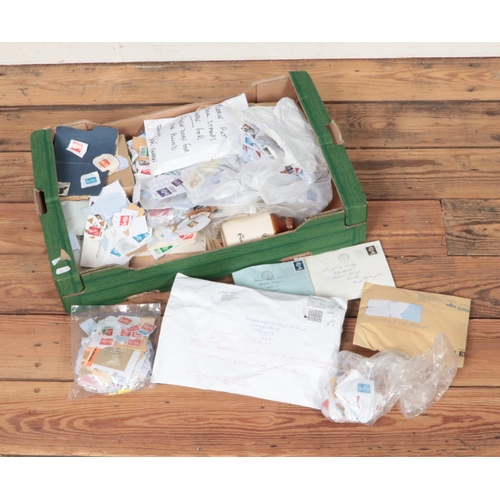 148 - A large box of loose mostly British stamps most bearing Queen Elizabeth II.