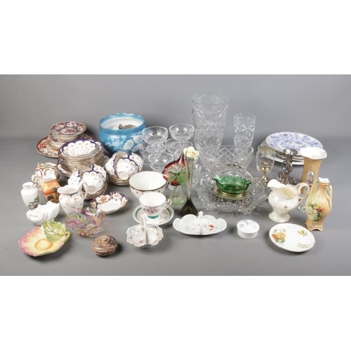 149 - A quantity of cutglass, ceramics and other collectables including teacups and saucers, large vases, ... 