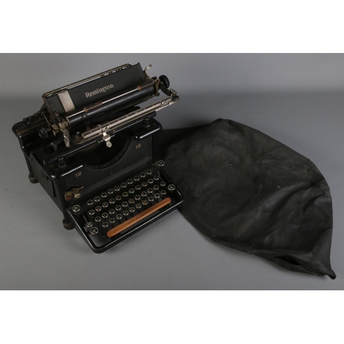 190 - A Remington Standard No.12 typewriter with original cover.