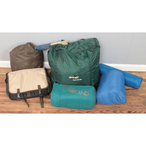 198 - A quantity of camping equipment. Includes Vango sleeping bag, Lichfield tent, etc.