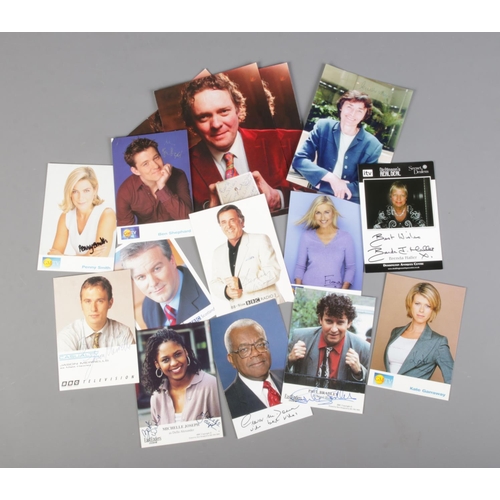 53 - A collection of Signed photos and autographs of television interested including Trevor McDonald, Pen... 
