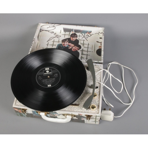 61 - The Beatles Westminster portable record player along with A Collection of Beatles Oldies vinyl recor... 