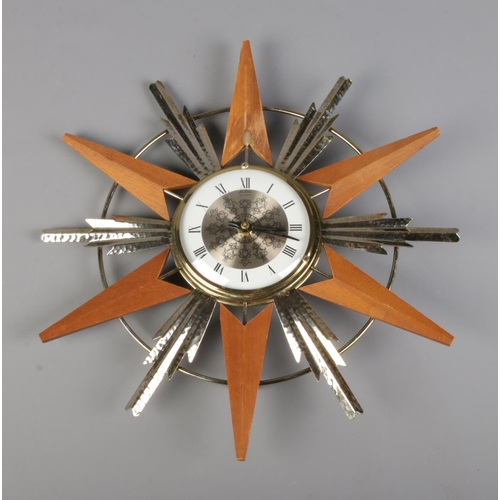 223 - A Bentima Battery starburst wall clock.