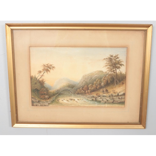 229 - A framed watercolour on board depicting a landscape scene with figures beside a river. Monogramed to... 