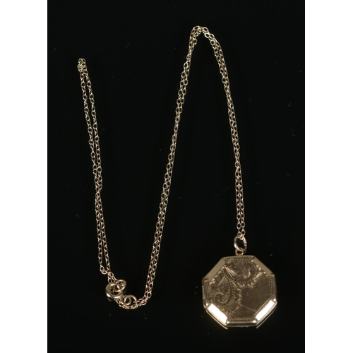 266 - A 9ct gold octagonal locket and chain. 3.2g.