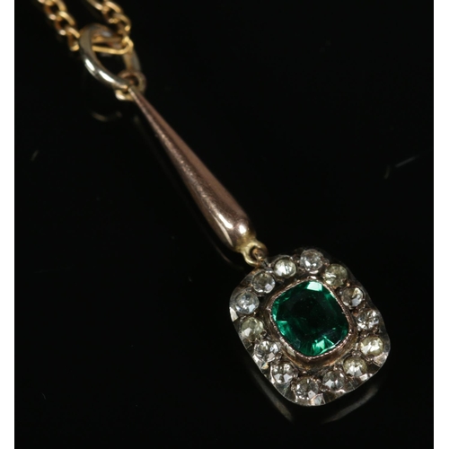 269 - A 9ct gold pendant on chain set with central green paste stone. Total weight 4g.