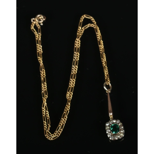 269 - A 9ct gold pendant on chain set with central green paste stone. Total weight 4g.