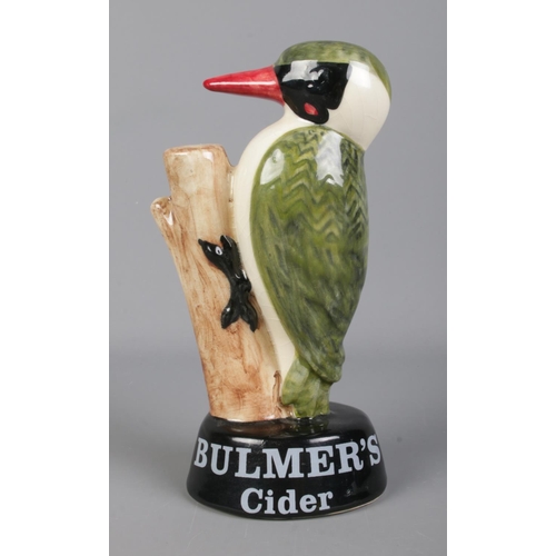 295 - A Carlton Ware ceramic advertising display of a woodpecker; for Bulmer's Cider. 20cm tall.