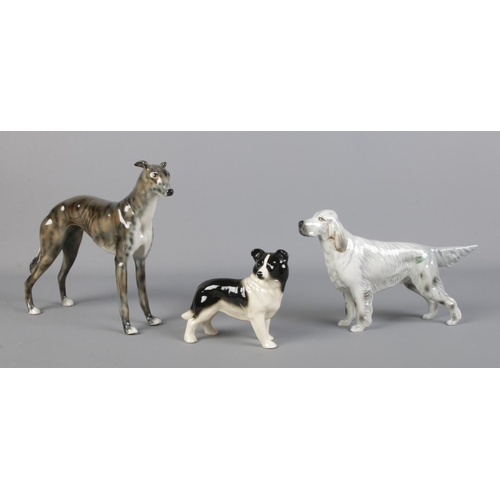 301 - Three Beswick and similar style ceramic dogs. To include Beswick grey setter; CH Bayldon Baronet and... 