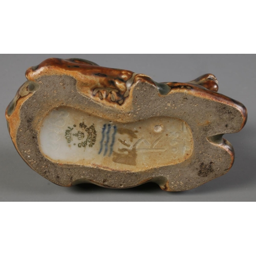 308 - A Royal Copenhagen stoneware figure formed as a recumbent deer. Possibly by  Knud Kyhn. (7cm x 10cm)