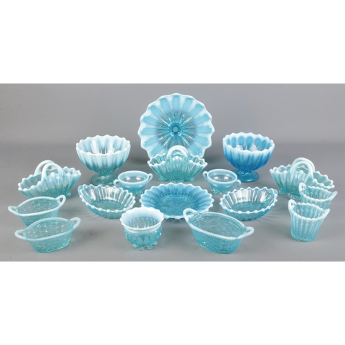 9 - A collection of Davidsons blue Pearline glass. Includes pair of baskets, pedestal bowls, etc.