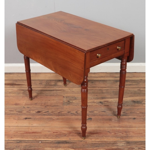 326 - A Victorian mahogany Pembroke table with brass feet.

Hx67cm
Wx76cm
Dx44cm