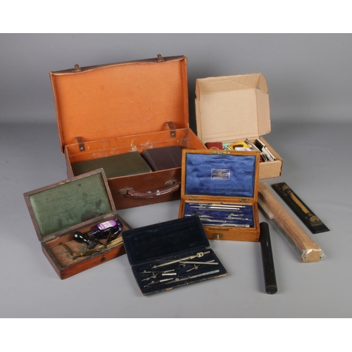 113 - A cased set of draughtsmans/drawing set, by J.Halden & Co Ltd together with other surveyors instrume... 