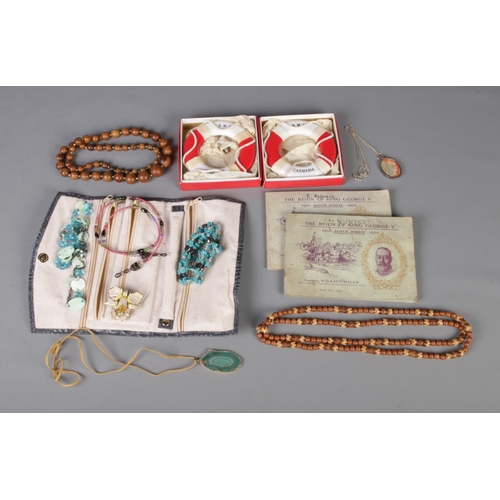 114 - A collection of assorted costume jewellery and collectables to include silver and mother of pearl ne... 