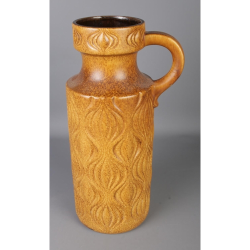 118 - A West German handled vase with brown glaze. Approx. height 46cm.