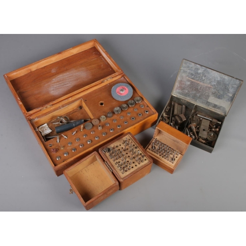 123 - A quantity of watch makers tools. Includes Star Suisse stacking set, etc.