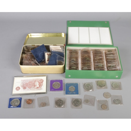 127 - Two boxes of mostly British coins to include small quantity of  pre-1920 silver, pre-1947 half-silve... 