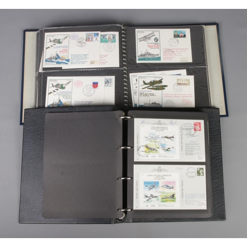 37 - Two albums of military First Day and First Flown Covers to include several signed and multi-signed e... 