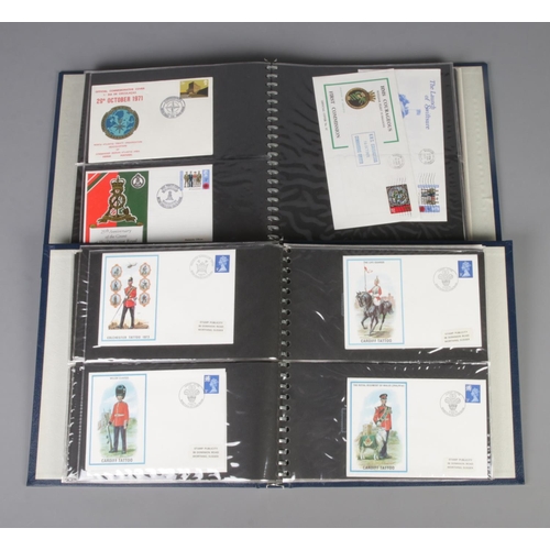58 - Two albums of military First Day Covers to include British Military Uniforms and Royal Air Force Fir... 