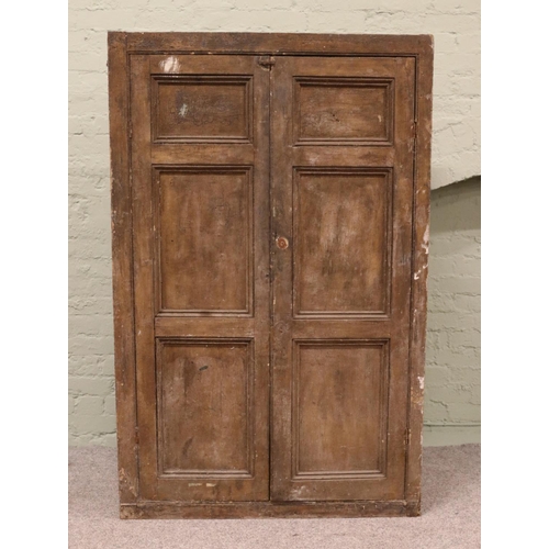 416 - A Victorian pine linen cupboard, with paneled front doors and shelved interior. Height: 164cm, Width... 