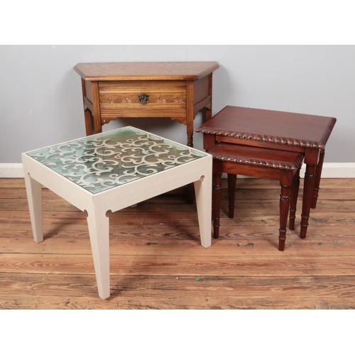 434 - Assorted furniture; a carved oak side table along with a painted mirror top coffee table and set of ... 