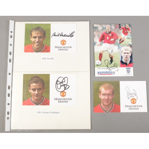 63 - Four signed Manchester United FC football cards. Includes autographs Paul Scholes, Ole Gunnar-Solksj... 