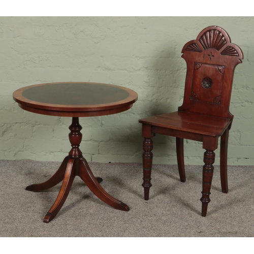 511 - A mahogany hall chair, with carved back and turned front feet, together with a small occasional tabl... 