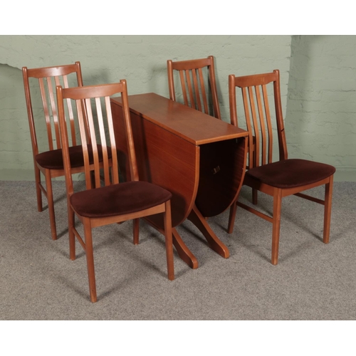 513 - A teak dropleaf table and 4 chairs.

Table measurements
Hx73cm
Wx150cm
Dx100cm