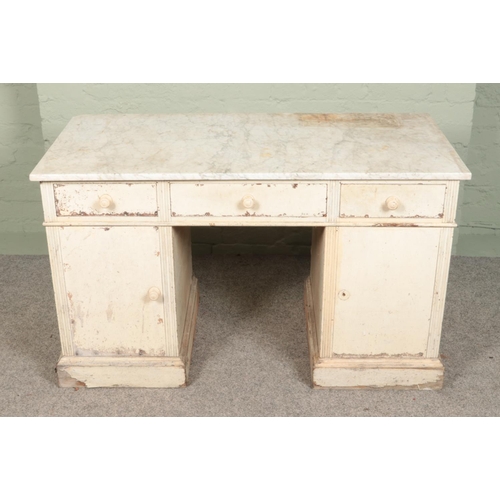 522 - A marble top desk 

Hx72cm
Wx123cm
Dx61cm