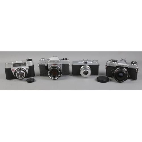 102 - Four cameras; Fujica ST605 with 3x lens, Topcon Uni 35mm film camera with Topcor 53mm lens, Leidox I... 