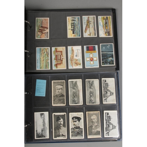 11 - Two albums of incomplete cigarette card sets mostly military examples by Gallaher and Will's includi... 