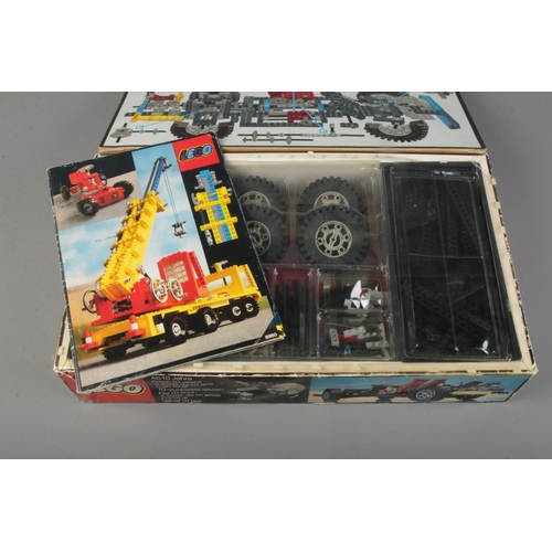 128 - A Lego 8860 technical set, box is open with parts organised into compartments, set unchecked for com... 