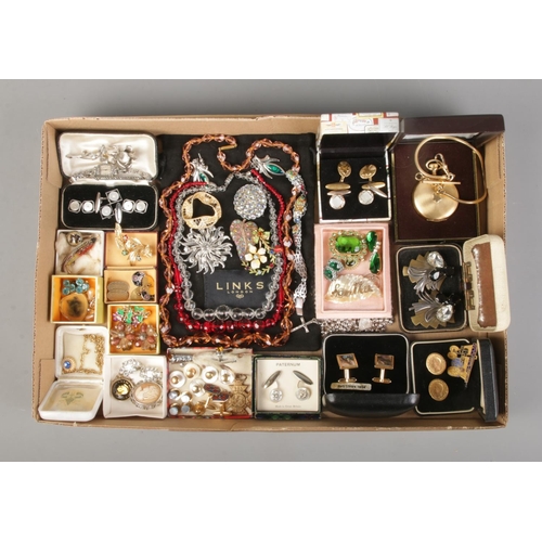 152 - A tray of vintage costume jewellery to include necklaces, brooches, bracelets, cufflinks, pocket wat... 