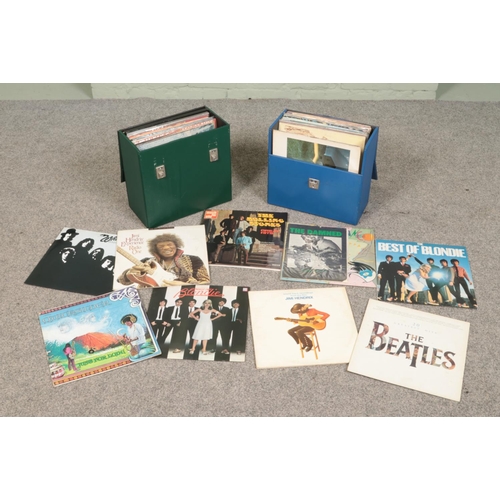 189 - A collection of LP records in two travel cases including The Beatles, Quick Silver, The Clash, Rick ... 