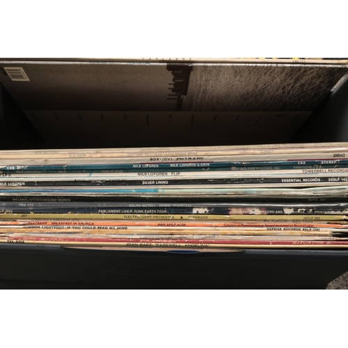 189 - A collection of LP records in two travel cases including The Beatles, Quick Silver, The Clash, Rick ... 