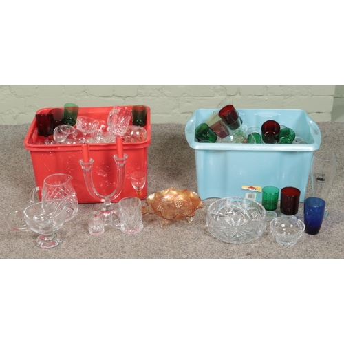 192 - Two boxes of assorted glassware, to include coloured, cut, carnival examples and candlesticks.