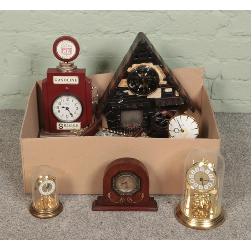 201 - A box of assorted clocks, to include torsion, atlas and novelty examples.