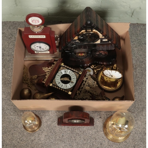 201 - A box of assorted clocks, to include torsion, atlas and novelty examples.