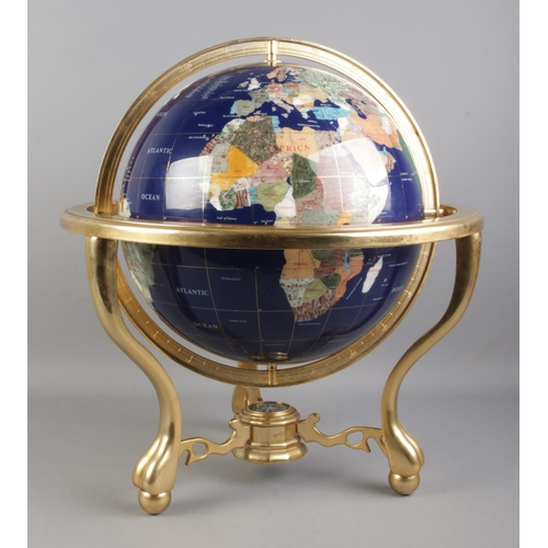 83 - A large modern gemstone globe, comprising of countries being composed of minerals and semi-precious ... 